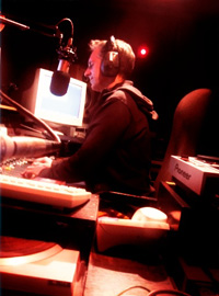 Photo of Jonathan Bellamy praying on air